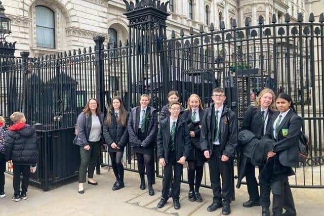 Pupils from St Bede’s Catholic School and Byron Sixth Form outside the gates of Downing Street.