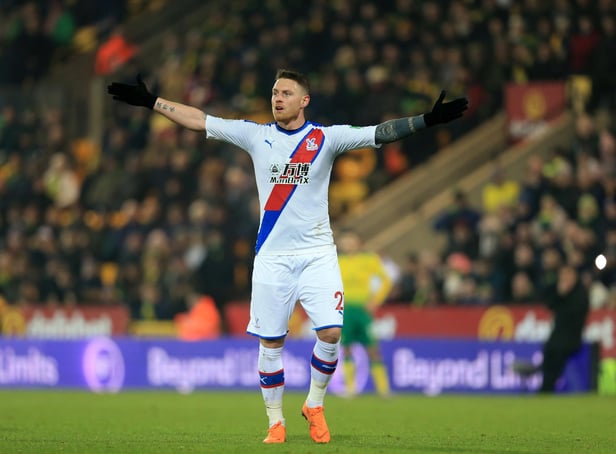 NORWICH, ENGLAND - JANUARY 01: Connor Wickham of Crystal Palace celebrates after scoring his team's first goal which is disallowed by referee Jonathan Moss but later awarded following a VAR check during the Premier League match between Norwich City and Crystal Palace at Carrow Road on January 01, 2020 in Norwich, United Kingdom. (Photo by Stephen Pond/Getty Images)