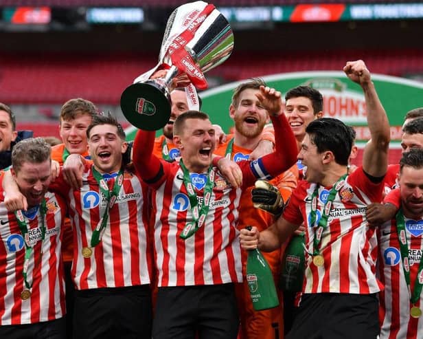 Max Power of Sunderland and teammates celebrate with the Papa John's Trophy at Wembley Stadium. (Photo by Justin Setterfield/Getty Images)