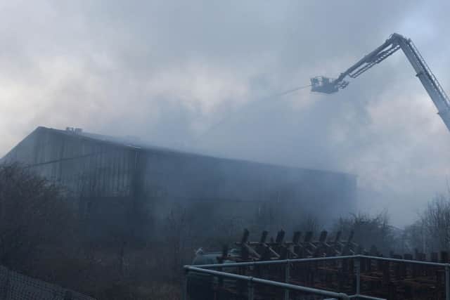 The remains of Shee Recycling after the fire.

Photograph: TWFRS