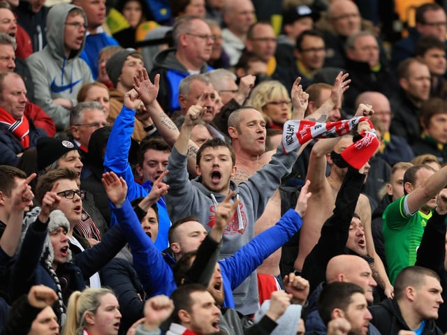 Sunderland fans sing during the Premier League match between Norwich City and Sunderland at Carrow Road on April 16, 2016.
