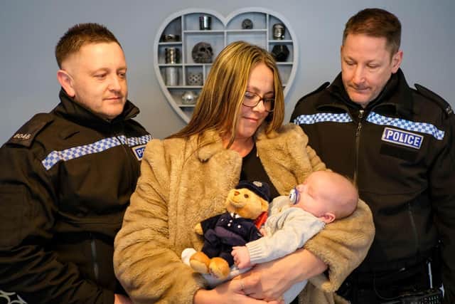 (from left) PC Andy Hutchinson, mum Arleen Avery, baby Lenny-Lee & PC Lee Fenwick
