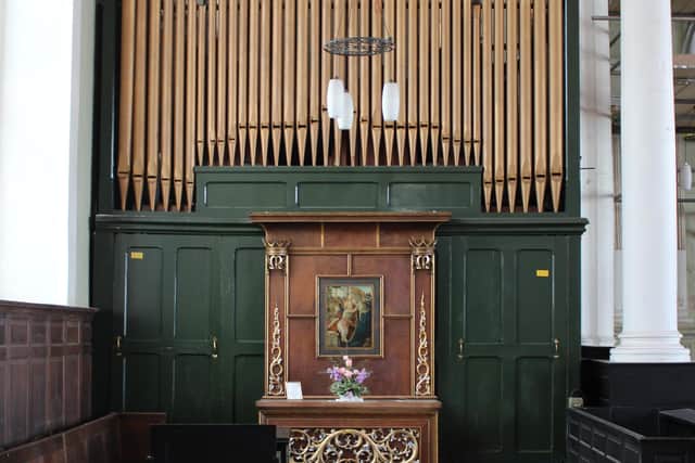The organ when it was in situ in Holy Trinity. It was built by H.J. Nelson & Co of Durham in 1936