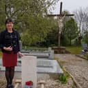 Regine Verguier at the graveside of Private Thomson.