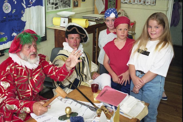 Pupils at Barnes Junior School travelled 500 years back in 1992 when they took part in an auction.  Patrick Wood, left, and James Gibson from the University of Sunderland were pictured with pupils, left to right: Craig Patchett, Kelvin Fairley and Deborah Frazer.