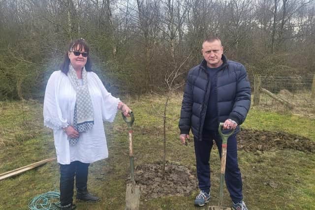 Ross' parents Debbie Herkes and Dave Irwin at the Mother's Day tree planting ceremony.