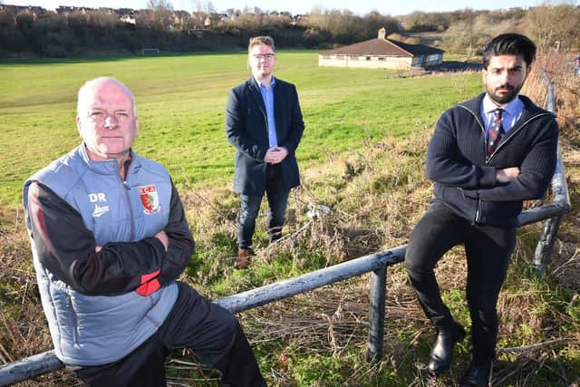 Dave Ramshaw, chairman of Sunderland RCA Youth Football Club, alongside Cllr Antony Mullen and Cllr Usman Ali and the football fields which have been plagued by joyriders. The club has received £40,000 of funding to erect a perimeter fence.