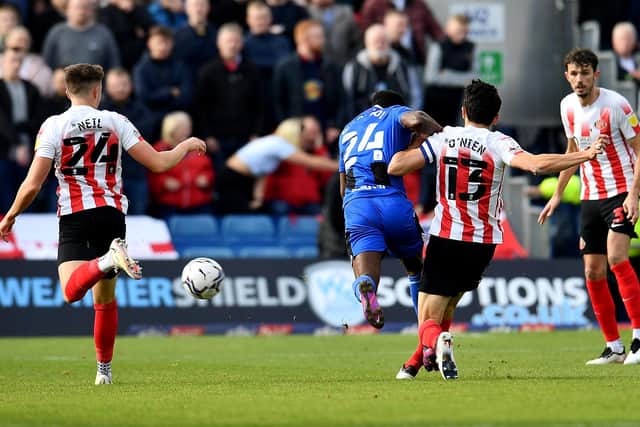 Luke O'Nien in action against Gillingham in League One on Saturday.