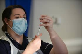 A Covid-19 vaccine is prepared for a patient at Sunderland's Grindon Lane Primary Care Centre - delays have been experienced in the delivery of the doses to its neighbouring NHS area in Easington.