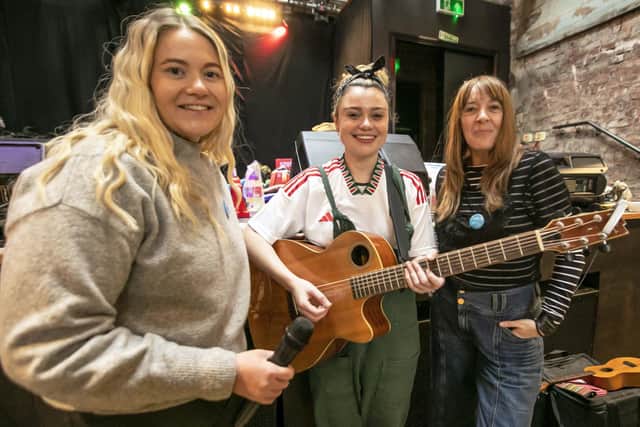 Musicians working on Sweet Caroline include, from left, Ashleigh Lowes, Paige Temperley and Carol Bowden. Picture by Victoria Wai.