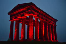 Penshaw Monument has been lit up red for Remembrance Sunday. Photo: North News.