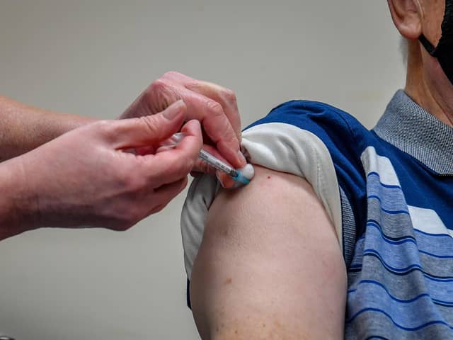 A single dose of the Oxford University/AstraZeneca COVID-19 vaccine is given to a patient. Picture by PA