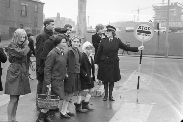 Ena Thompson was the first female traffic warden in Sunderland. She was pictured conducting pedestrians over a crossing on her High Street to Chester Road "beat" in 1968.