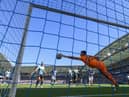 BRIGHTON, ENGLAND - AUGUST 13: Nick Pope of Newcastle United makes a save during the Premier League match between Brighton & Hove Albion and Newcastle United at American Express Community Stadium on August 13, 2022 in Brighton, England. (Photo by Mike Hewitt/Getty Images)