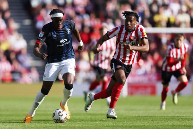 Town striker Elijah Adebayo looks to get forward against Sunderland