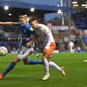 BIRMINGHAM, ENGLAND - NOVEMBER 27: Kristian Pedersen of Birmingham City is challenged by Owen Dale of Blackpool during the Sky Bet Championship match between Birmingham City and Blackpool at St Andrew's Trillion Trophy Stadium on November 27, 2021 in Birmingham, England. (Photo by Tony Marshall/Getty Images)