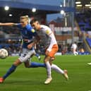 BIRMINGHAM, ENGLAND - NOVEMBER 27: Kristian Pedersen of Birmingham City is challenged by Owen Dale of Blackpool during the Sky Bet Championship match between Birmingham City and Blackpool at St Andrew's Trillion Trophy Stadium on November 27, 2021 in Birmingham, England. (Photo by Tony Marshall/Getty Images)