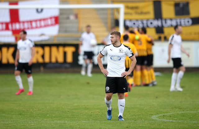 Gateshead players react after conceding their fourth goal during the Vanarama National League North Play-Off Semi-final match between Boston United.