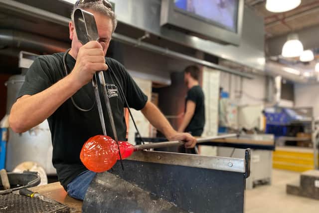 Shaping the glass into a pumpkin