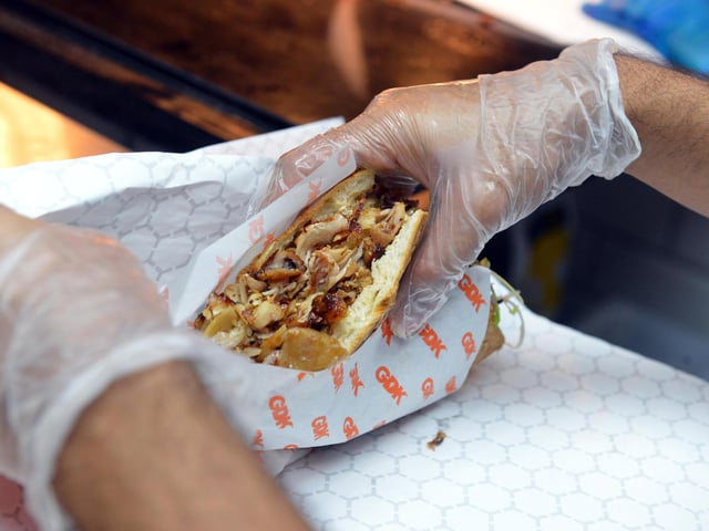 Kebabs are served with signature sauces.