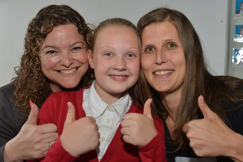 Sacred Heart Primary school pupil Leah Coulson was pictured 6 years ago after she had not missed a day at school. Here she is with her teacher Amanda Howell (left) and mum Bev.