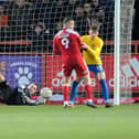 Thorben Hoffmann makes a save at Accrington Stanley