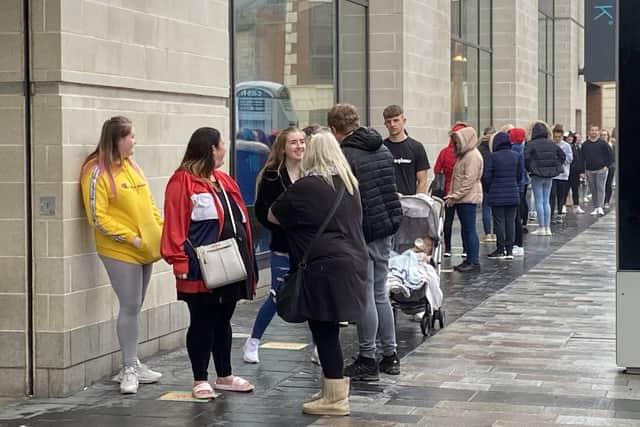 Queues of people wait to shop at Primark as Sunderland shops reopen following lockdown.
