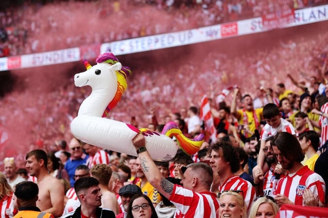 Sunderland supporters celebrating the final score...with an inflatable unicorn