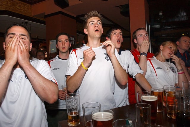 It's a tough watch as these fans watch England on the big screen in 2006.