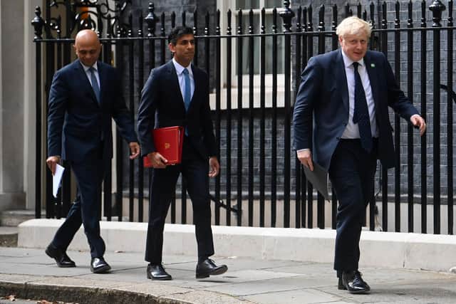 Sajid Javid, Rishi Sunak and Prime Minister Boris Johnson. Chancellor of the Exchequer Rishi Sunak and Health Secretary Sajid Javid, have resigned after the Prime Minister was forced into a humiliating apology over his handling of the Chris Pincher row after it emerged he had forgotten about being told of previous allegations of "inappropriate" conduct. Issue date: Tuesday July 5, 2022.