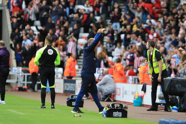 Alex Neil celebrates Sunderland's first goal of the Championship campaign