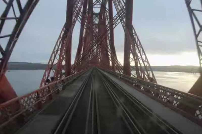 A view from the cab as a train crosses the Forth Bridge.