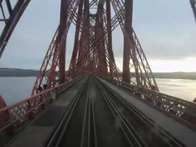 A view from the cab as a train crosses the Forth Bridge.