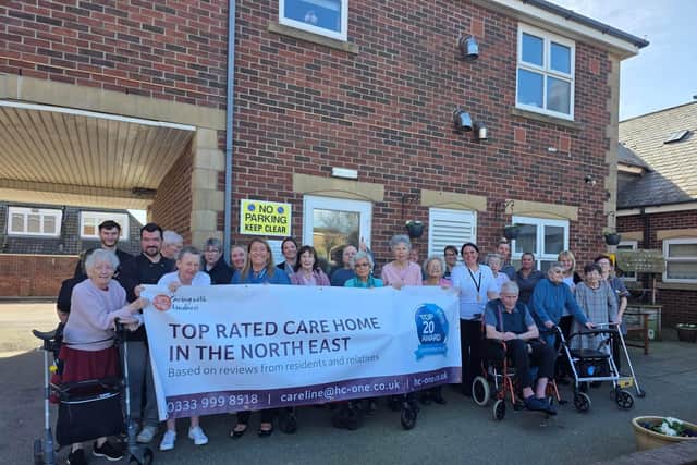 The team at Falstone Court Care Home celebrating their Top 20 Carehome.co.uk success