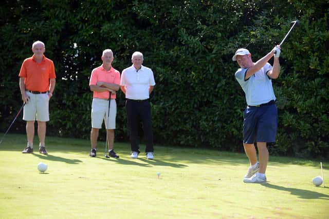 Organiser Craig Mathieson tees off at the Niemann-Pick UK charity golf day. Picture by Stu Norton.