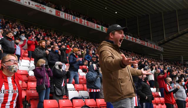 SUNDERLAND, ENGLAND - MAY 22: A Sunderland fan celebrates after the first Sunderland goal during the Sky Bet League One Play-off Semi Final 2nd Leg match between Sunderland and Lincoln City  at Stadium of Light on May 22, 2021 in Sunderland, England. (Photo by Stu Forster/Getty Images)