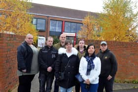 Parents of disabled children gather outside of Grace House over a dispute about criteria which is preventing their children being able to attend a youth group at the centre.