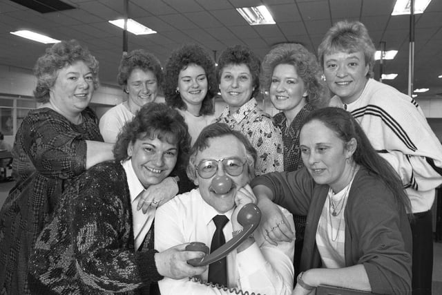 Brian Mills telephonist works on Comic Relief day in March 1989.