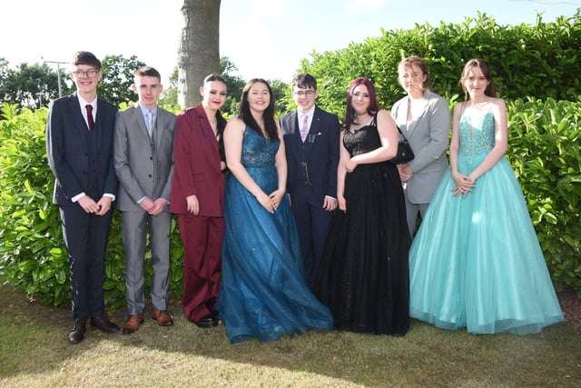 Year 11 pupils pose for a photograph in the grounds of the Ramside Hall Hotel.
