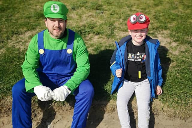 Jacob Sinclair and his Uncle Lee, dressed as Luigi