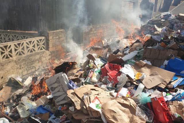 Burning waste tipped out of bin lorry in Whickham (image Gateshead Council)