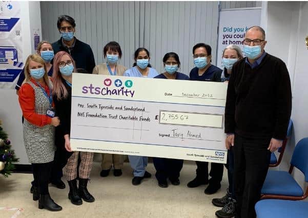 Members of the Renal Unit at Sunderland Royal Hospital receiving their cheque, with Dr Sid Ahmed, back left, and Tracy and Tariq Ahmed, to the right