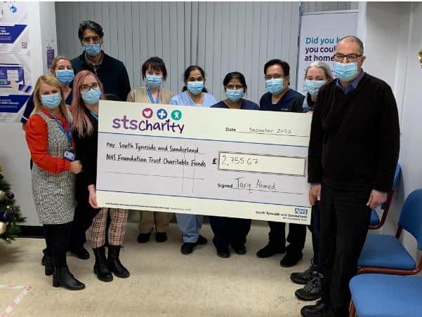 Members of the Renal Unit at Sunderland Royal Hospital receiving their cheque, with Dr Sid Ahmed, back left, and Tracy and Tariq Ahmed, to the right