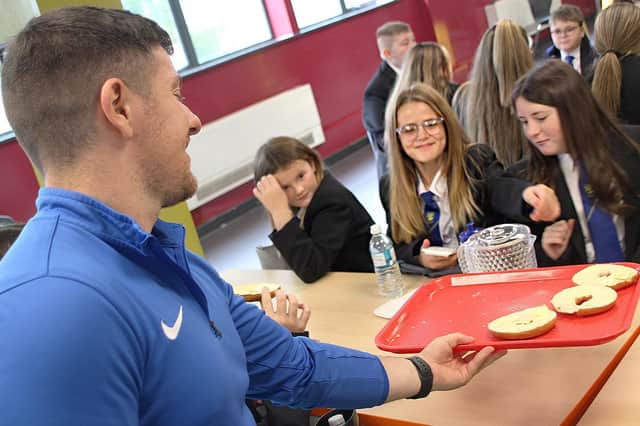 Teachers and pupils start the day with ‘family breakfast’ in new programme aimed at building better relationships