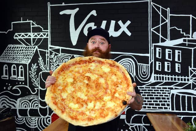 Slice 24 inch pizza competition at Vaux. Head brewer Les Stoker.