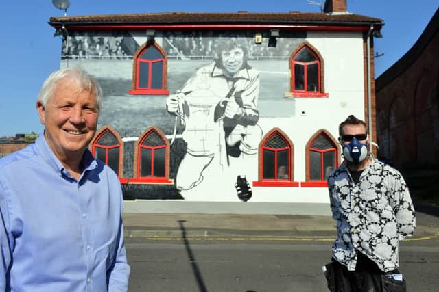 Artist Frank Styles with Jimmy Montgomery outside The Times Inn new Monty mural 