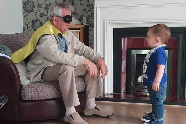 What a superhero. Jack with his grandson Isaac.