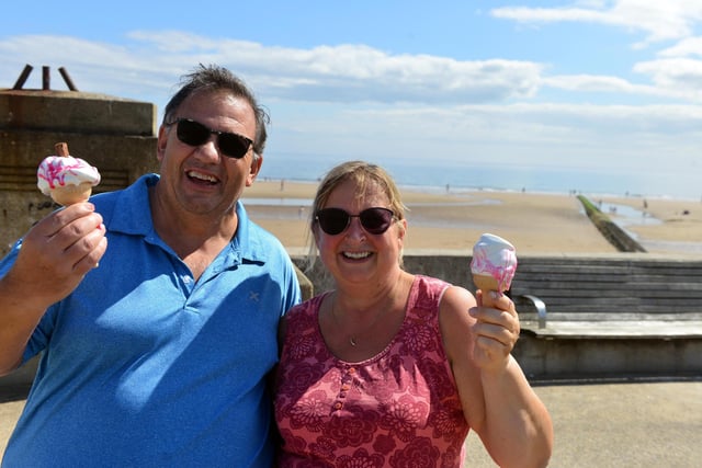 David and Janet Taylor cooling off with ice cream during the heatwave at Seaburn Beach