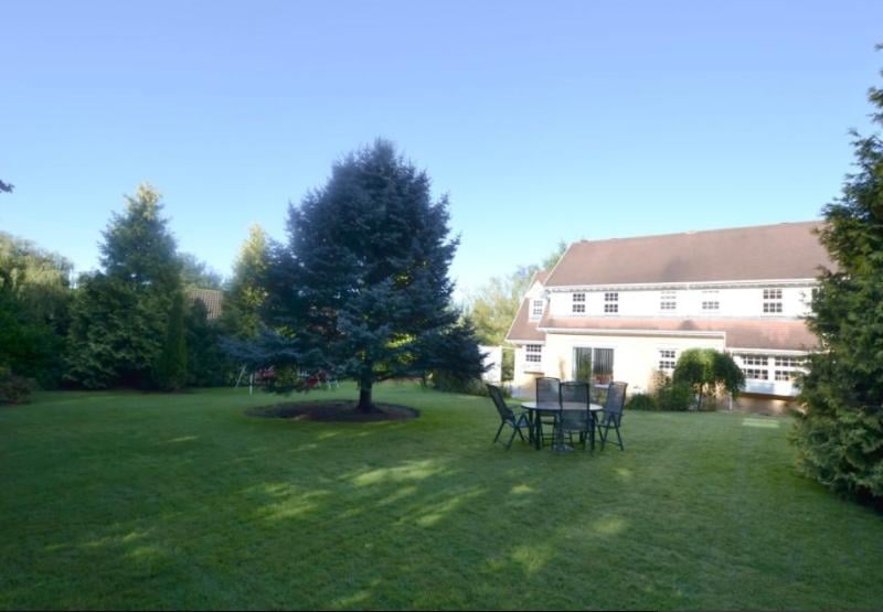 The plot offers 0.5 acres and to the rear of the property is a well established and private garden with impressive outlook.
