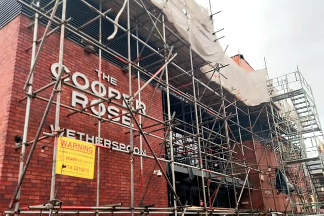 Scaffolding is still up at the Cooper Rose, which is scheduled to open on Sunday, January 23.